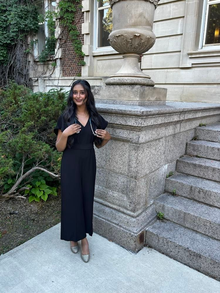 Surina Grover, in front of a university building